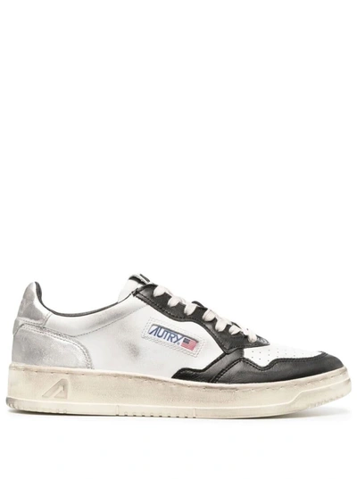 Shop Autry Black And White 'medalist' Low Top Sneakers Distressed Finish In Cow Leather