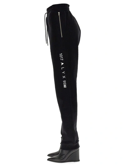 Shop Alyx 1017  9sm Jogging Pants "visual" Unisex In Black