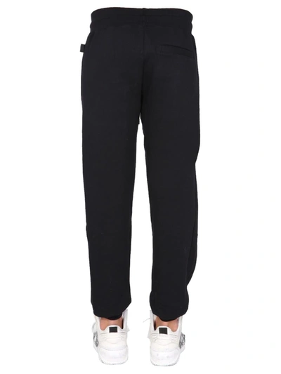 Gcds Jogging Pants With Cute Tape Logo Band In Black