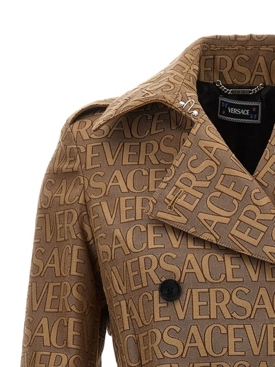 Shop Versace Cotton Blend Trench Coat In Beige