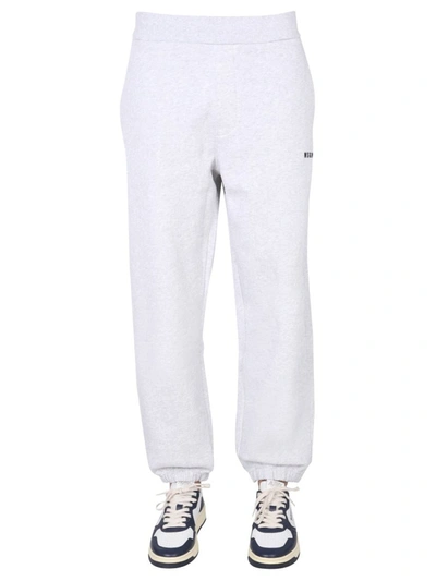 Shop Msgm Jogging Pants With Logo In Grey