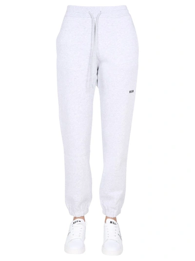 Shop Msgm Jogging Pants With Logo Print In Grey