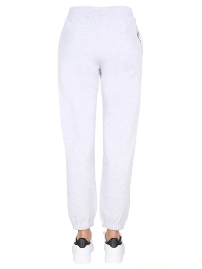 Shop Msgm Jogging Pants With Logo Print In Grey