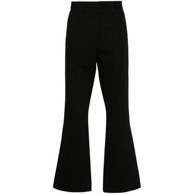 Shop Amiri Pants In Black