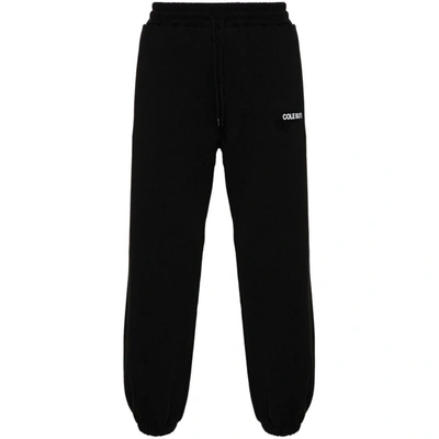 Shop Cole Buxton Pants In Black