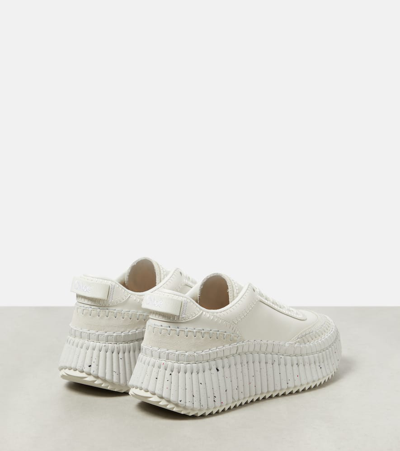 Shop Chloé Nama Leather Sneakers In White