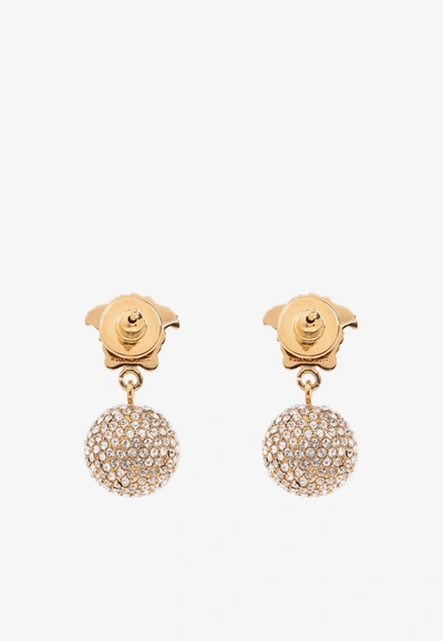 Shop Versace Crystal Embellished Medusa Drop Earrings In Gold