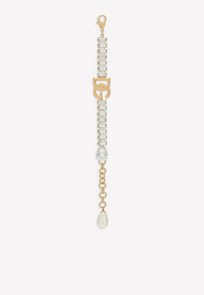 Shop Dolce & Gabbana Crystal-embellished Dg Logo Bracelet In Gold
