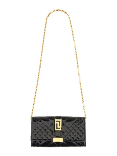 Shop Versace "greca Goddess" Clutch Bag In Black