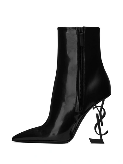 Shop Saint Laurent Opyum Leather Ankle Boots In Black