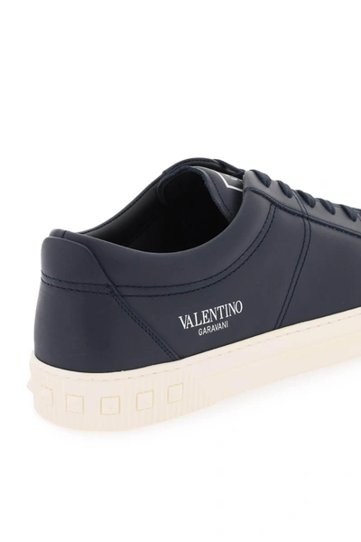Shop Valentino Garavani Leather Cityplanet Sneakers