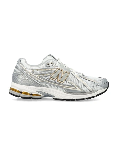 Shop New Balance 1906 Sneakers In White Gold