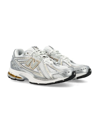 Shop New Balance 1906 Sneakers In White Gold