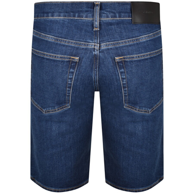 Shop Calvin Klein Slim Mid Wash Denim Shorts Blue