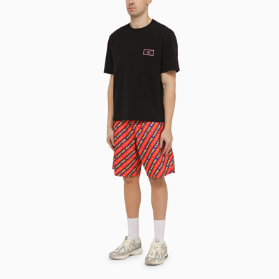 Shop Martine Rose Red Bermuda Shorts With Logo Print