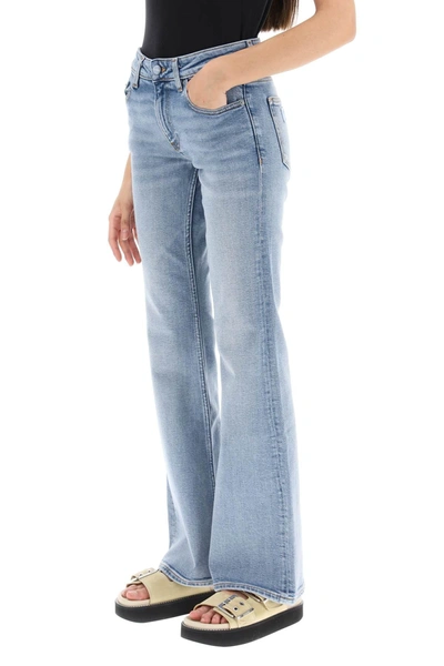 Shop Ganni 'iry' Jeans With Light Wash
