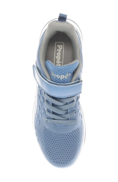 Shop Propét Travelactiv Axial Fx Sneaker In Denim/ Grey