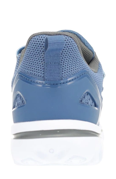 Shop Propét Travelactiv Axial Fx Sneaker In Denim/ Grey