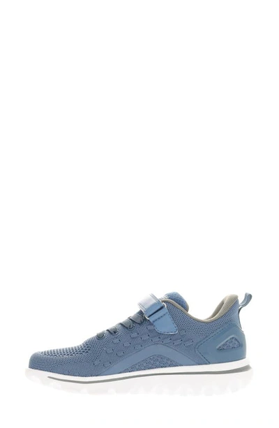 Shop Propét Travelactiv Axial Fx Sneaker In Denim/ Grey