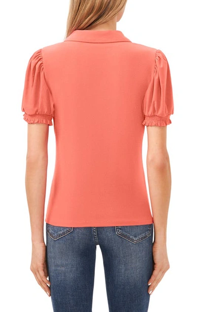Shop Cece Short Puff Sleeve Knit Polo In Calypso Coral