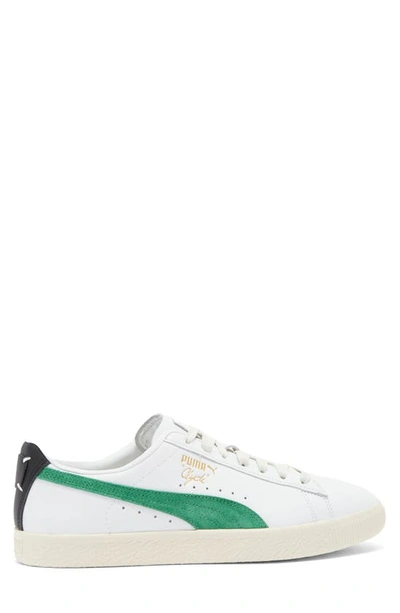 Shop Puma Clyde Sneaker In  White-archive Green-black