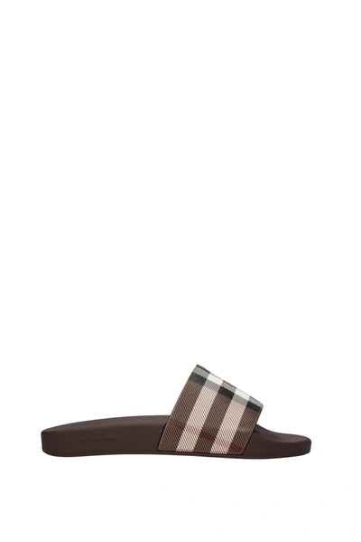 Shop Burberry Slippers And Clogs Rubber Brown Birch