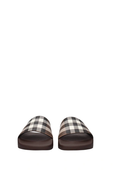 Shop Burberry Slippers And Clogs Rubber Brown Birch