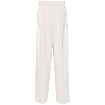 Shop Theory Pants In Neutrals