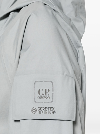 Shop C.p. Company Gore-tex 3l Infinium Hooded Jacket In Grigio