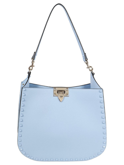 Shop Valentino Garavani Rockstud Strapped Shoulder Bag In Blue