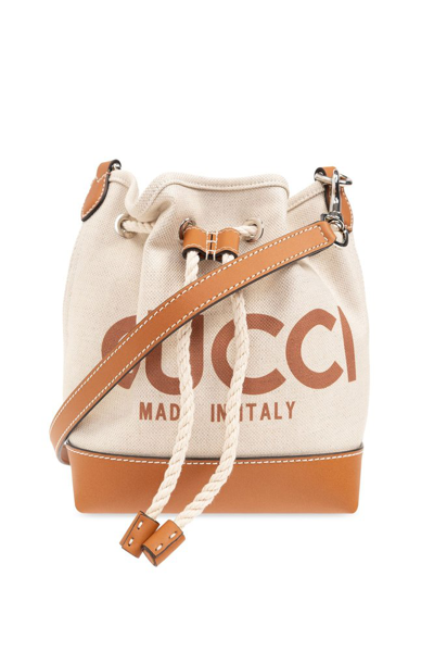 Shop Gucci Reversible Drawstring Mini Bucket Bag In Multi