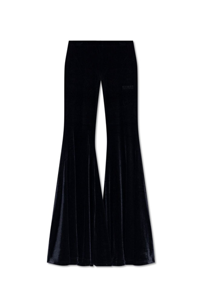 Shop Vetements Logo Detailed Velvet Trousers In Black