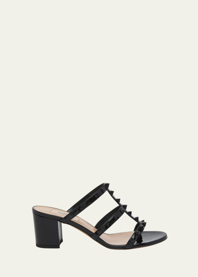 Shop Valentino Rockstud Patent Tonal Caged Slide Sandals In 0no Nero