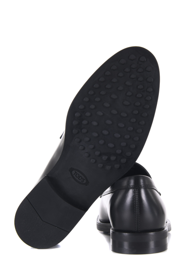 Tod's Smooth Leather Moccasin Loafers With Subtle Stitching