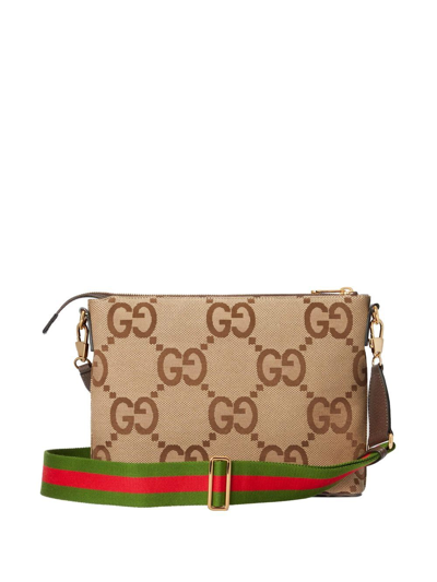 Shop Gucci Jumbo Gg Crossbody Bag In Brown