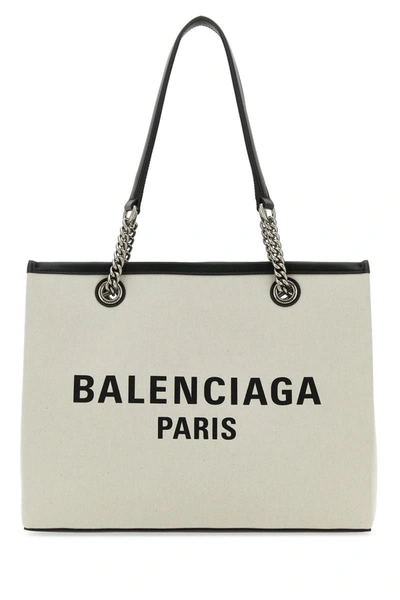 Shop Balenciaga Handbags. In Naturel