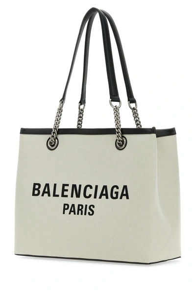 Shop Balenciaga Handbags. In Naturel