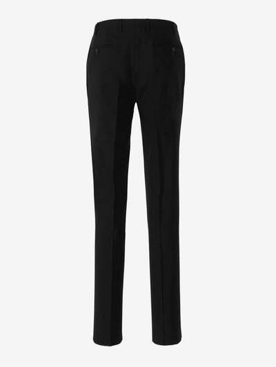 Shop Canali Wool Pleated Trousers In Black