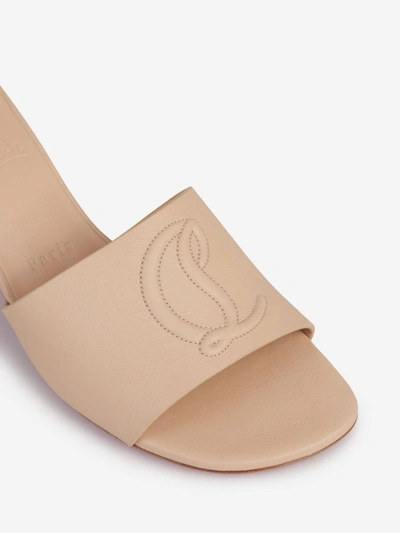 Shop Christian Louboutin Monogram Leather Mules In Crema