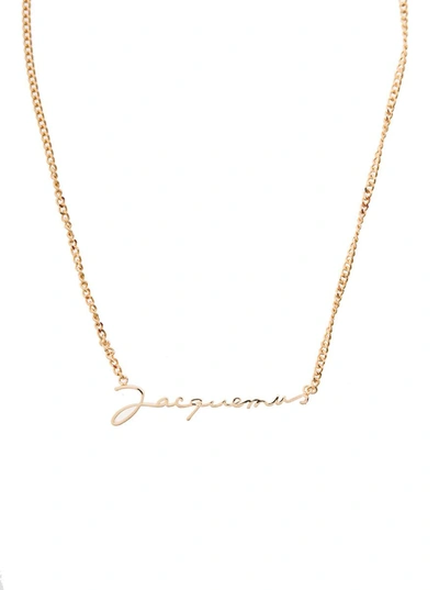 Shop Jacquemus Gold-tone Le Chaine Necklace With Logo Plaque In Brass Woman In Grey