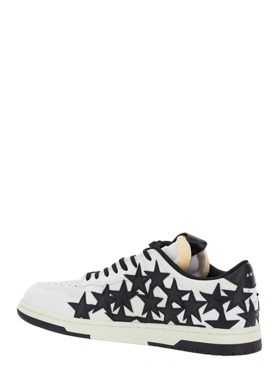 Shop Amiri Black And White Low Top Sneakers With Stars In Leather Man In White/black
