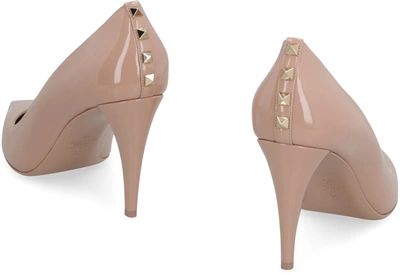 Shop Valentino Rockstud Patent Leather Pumps In Pale Pink