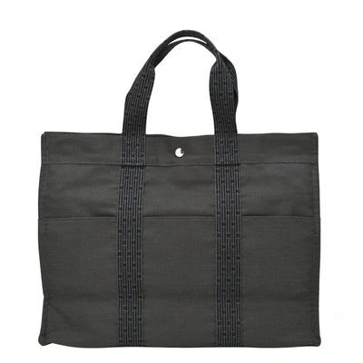 Shop Hermes Hermès Herline Grey Canvas Tote Bag ()
