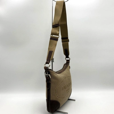 Shop Prada Beige Canvas Shoulder Bag ()