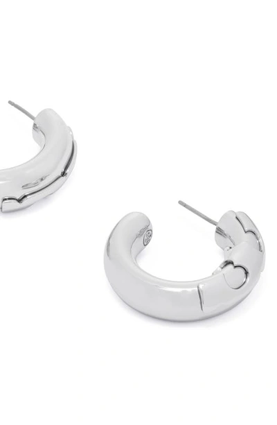 Shop Tory Burch Kira Essential Hoop Earrings In Tory Silver