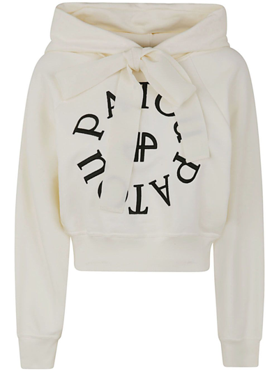 Shop Patou Cropped Medallion Logo Hoodie In Nude & Neutrals
