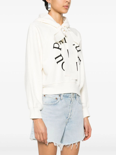 Shop Patou Cropped Medallion Logo Hoodie In Nude & Neutrals
