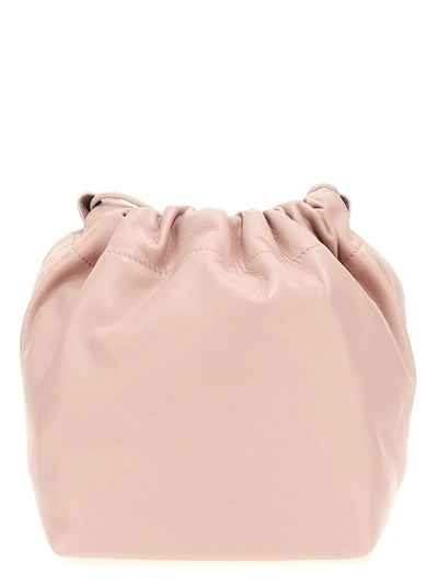 Shop Jil Sander Dumpling Crossbody Bags Pink