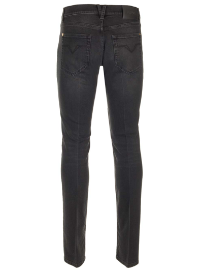 Shop Versace Stretch Denim Slim Fit Jeans In Black