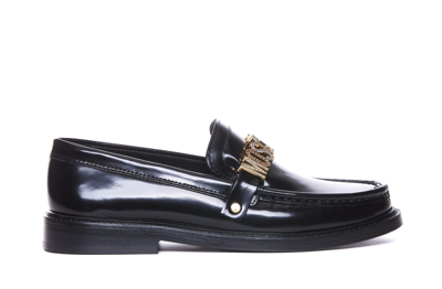 Shop Moschino Logo Lettering Loafers In Black
